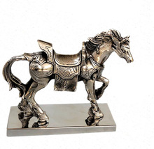 NICKLE PLATED WALKIING HORSE STATUE