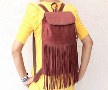 Aryan Exports Suede Leather Fringe Backpack, Capacity : 30 - 40L