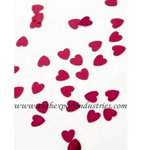 Red heart confetti for wedding table