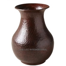 hammered metal vase