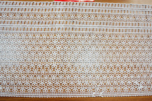 CHEMICAL CUTTING LACE WITH TEXTURE YARN