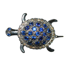 silver turtle shape diamond and blue sapphire ring