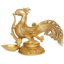 Metal Deepak stand with handcrafted bird peacock statue