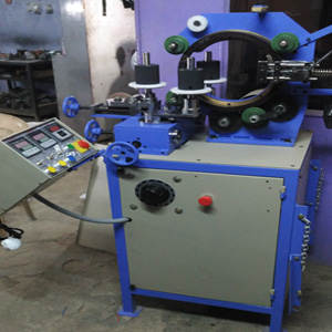 Toroidal coil winding machine