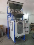 FLATTENED RICE POUCH PACKING MACHINE