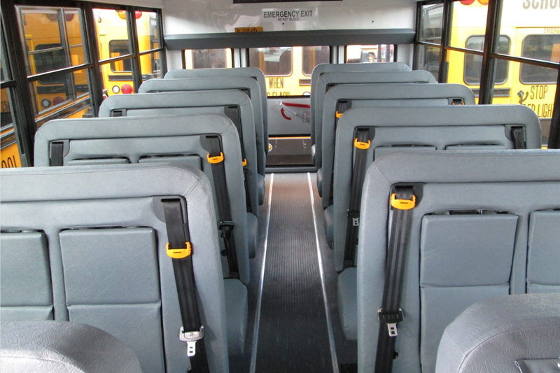 Seat belts for school buses