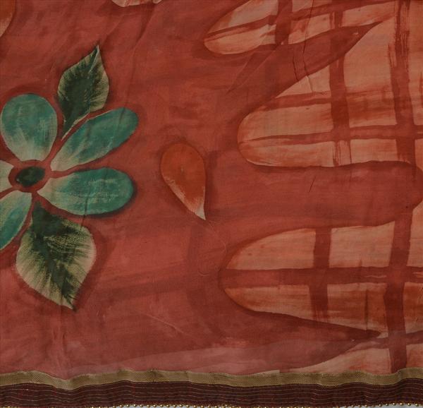 maroon & pink colored embroidered printed georgette sari