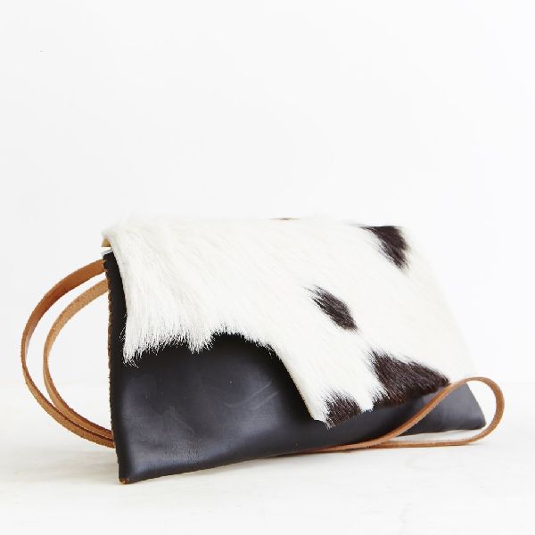 Leather Hairon Cross Body Bag, for Office, Travel, Feature : Shiny Look, Smooth Texture