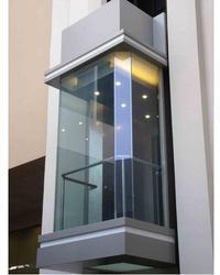 Rectangular Manual glass elevation, for Complex, Home, Malls, Office, Voltage : 110V, 220V, 380V