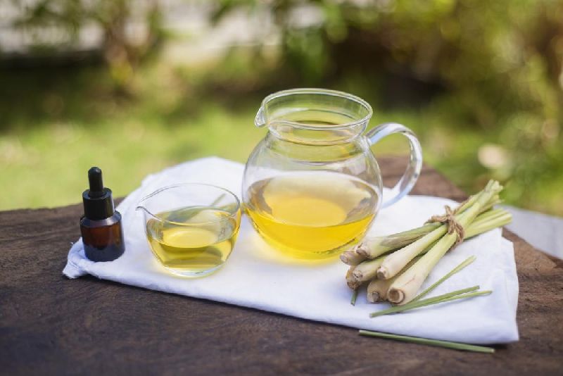 Organic Pure Lemongrass Oil, for Flavouring Tea, Reduce Body Aches, Form : Liquid