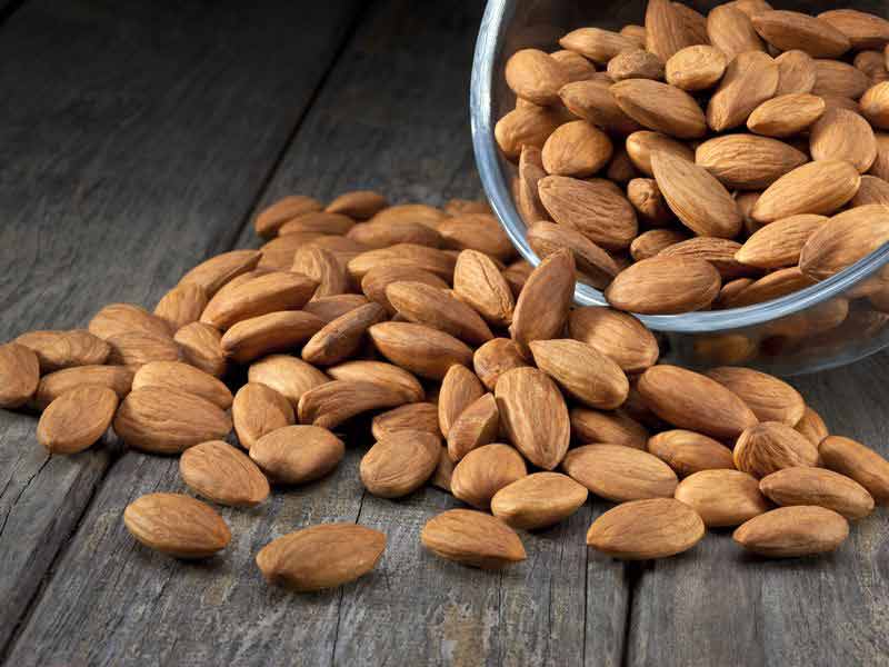 Common Natural Almond Nuts, for Sweets, Style : Dried