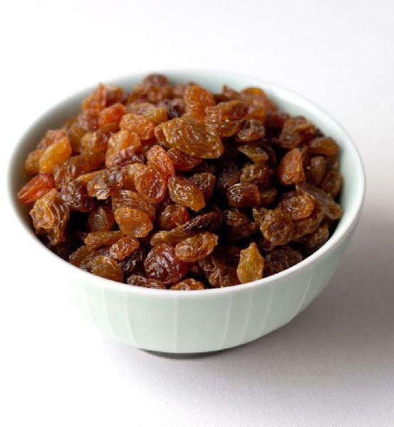 Elongated Brown Dried Raisins, Taste : Sweet
