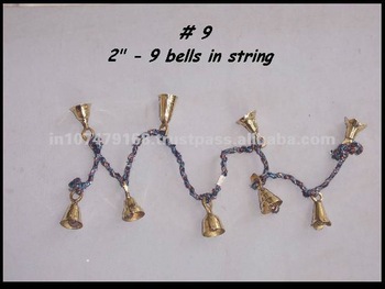 brass bell in a string wind chime