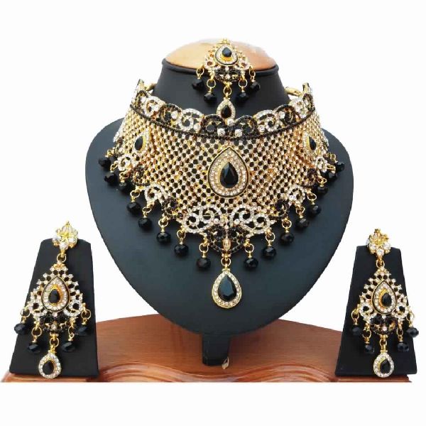 Catching Gold Plated Party Wear Handmade Ethnic Zircon Necklace set