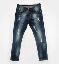 Women jean with distressed effects, Technics : WASHED