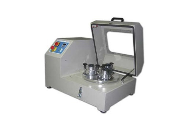 Surface abrasion testing machine