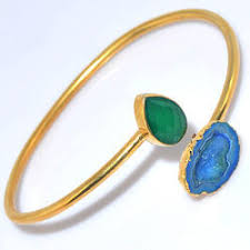 Non Polished Gold Gemstone Bangle, Feature : Attractive Designs, Shiny Look, Smooth Texture, Unique Color