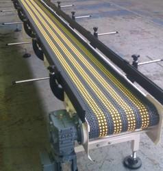 Polished Roller Belt Conveyor System, for Moving Goods, Feature : Excellent Quality, Heat Resistant