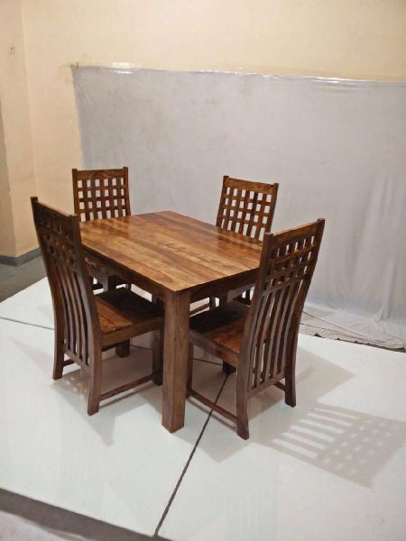 Polished Wood Four Seater dining Set, for Home, Hotel, Restaurant, Feature : Attractive Designs, Easy To Place