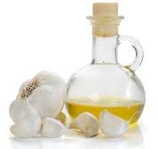 Yellow Liquid Garlic Oil, for Foods, Packaging Type : Plastic Bottle