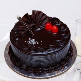 Rectangular Chocolate Truffle Cake, for Eating Use, Packaging Type : Paper Box