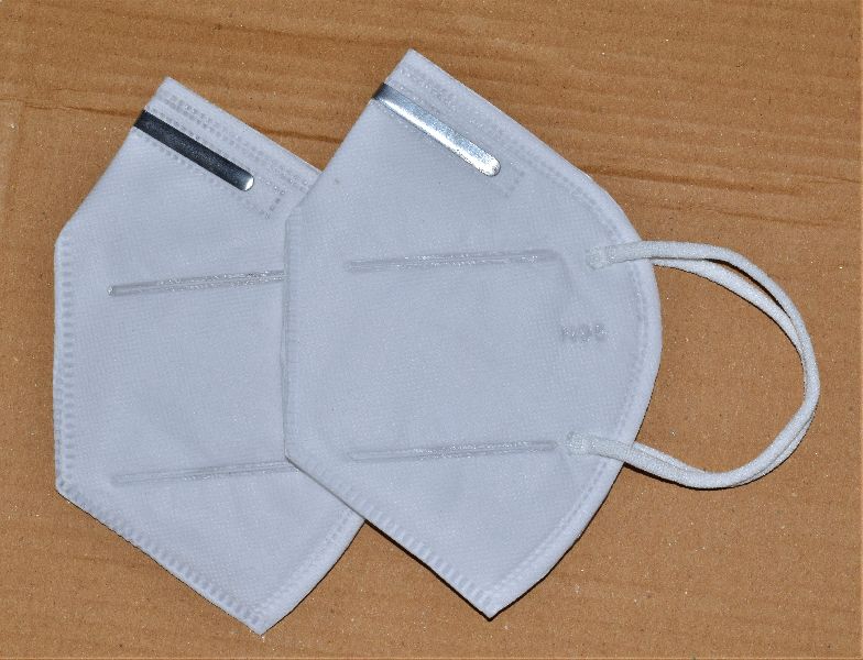 Non Woven White N95 Face Mask, for Clinics, Hospitals, Industries, Feature : Anti Bacterial, High Durability