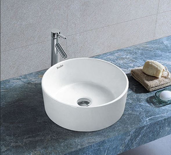 Ceramic Polished Table Top Wash Basin, for Home, Hotel, Office, Restaurant, Pattern : Plain