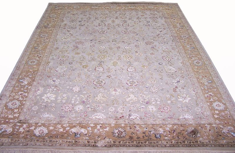 Fine Hand knotted Wool-silk carpet.