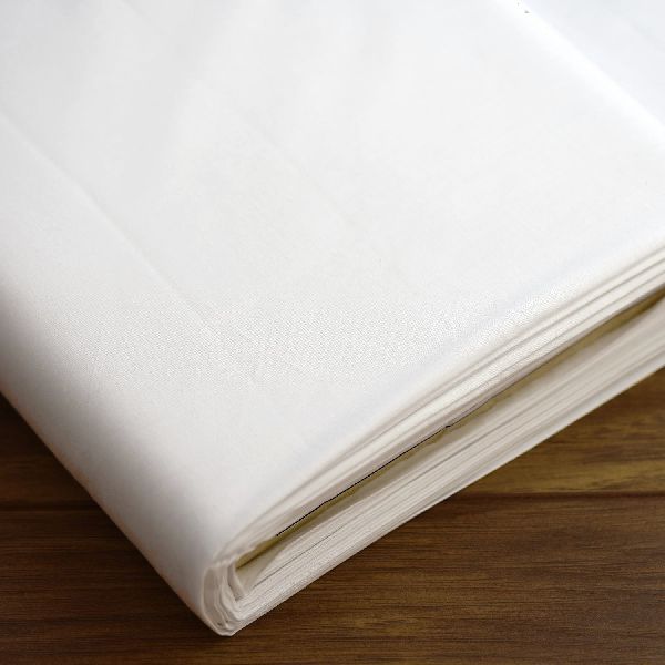 Plain Cotton Fabric, for Bedsheet, Curtains, Garments, Style : Dobby