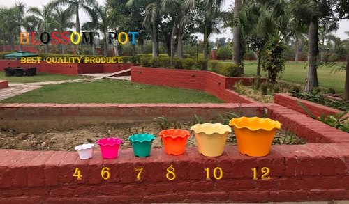 Polished Hdpe Blossom Plastic Planter, for Decoration, Feature : Attractive Pattern, Dust Free, Easy To Placed
