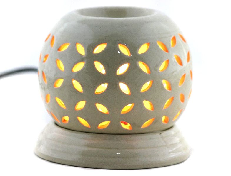 Oval Electric Ceramic Diffuser, for Interior Decor, Feature : Fine Finishing