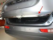 Polished Metal Trunk Door Garnish Cover, for Automotive, Feature : Good Quality