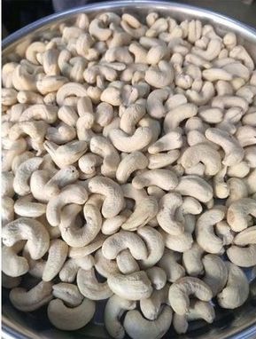 Raw W210 Whole Cashew Nuts, Packaging Type : Vacuum Bag