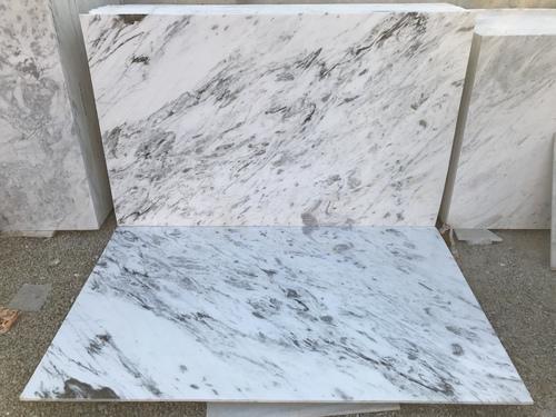 Polished Indian Statuario Marble Stone, for Countertops, Flooring, Feature : Attractive Design, Dust Resistance