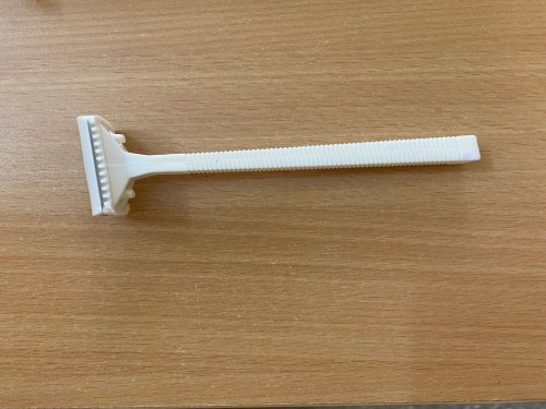 Plastic disposable razor