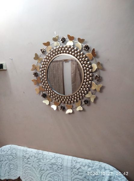 Golden hanging wall mirrors