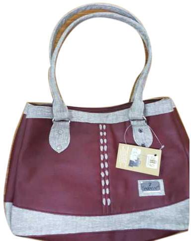 Leather Plain Ladies Fancy Handbag, Technics : Machine Made