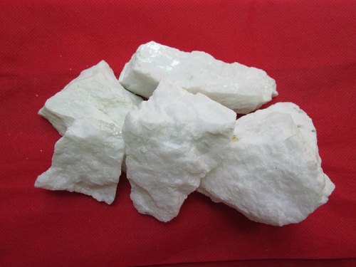 Sodium Feldspar Lumps, for Industrial, Packaging Type : Plastic Bags