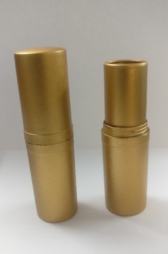 Nexus Corporation round PP or ABS plastic Golden Lipstick container