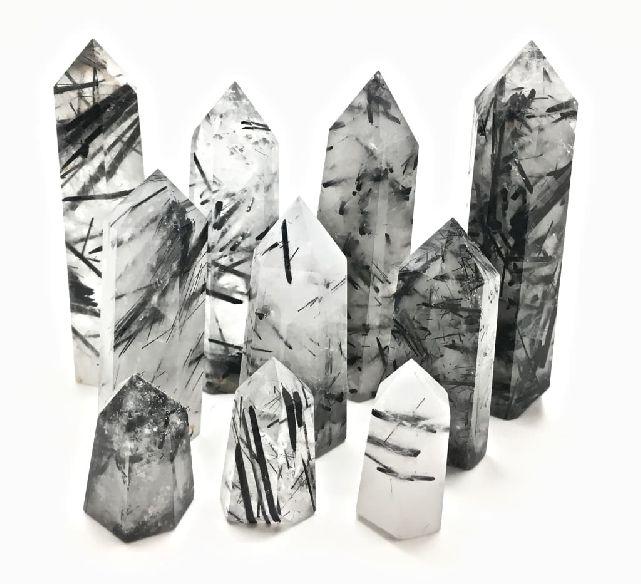 Tourmaline Quartz Crystal Point, for Healing, Feature : Fine Finished