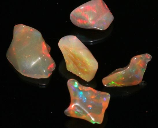 T84 Polished Opal Stones, for Jewellery, Shape : Tumble