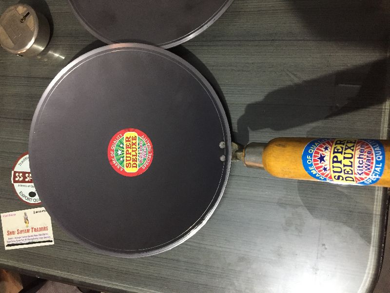 Wooden Steel Concave iron chapati tawa, for Cooking, Home, Feature : Attractive Design, Heat Resistance