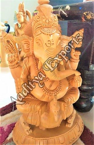 Wooden Polished Ganesh Statue, for Interior Decor, Pattern : Carved