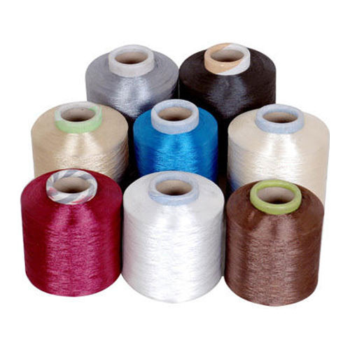 Double Twist Fancy Polyester Yarn, for Textile Industry, Specialities : Seamless Finish, Good Quality