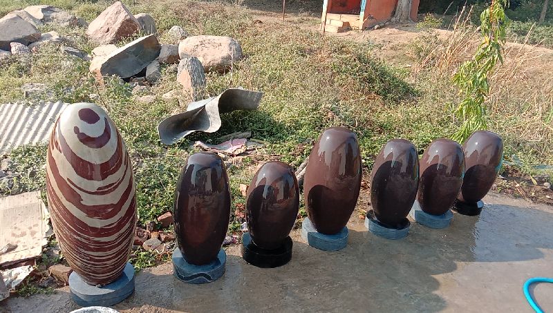 Oval Best Polished Narmdeshawar Shivling stone, for Temple, Feature : Munufectures