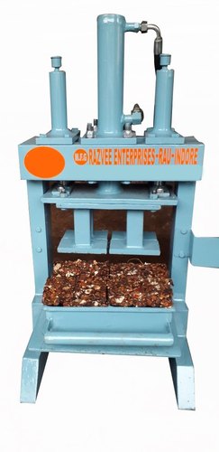 Khajur Lata Cake Hydraulic Pressing Machine For Dates Tamarind Manufacturer  & Seller in Rajkot - Paqee Packaging