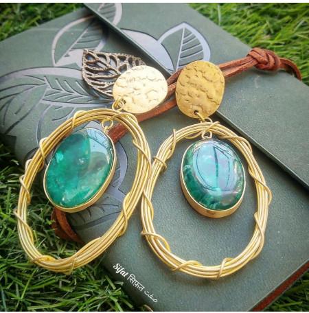 Oval Brass Danglers, Color : Golden with GREEN stone