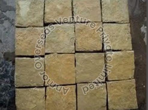 Bush Hammered Plain Yellow Granite Cobbles, for Vanity Tops, Feature : Durable, Striking Colours