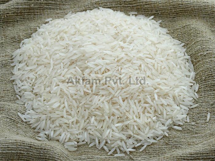 White Soft Common Raw Basmati Rice, for Cooking, Food, Human Consumption, Packaging Type : Bag
