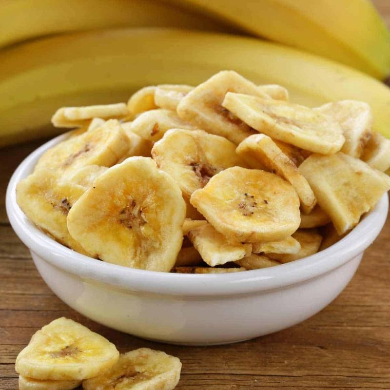 Brownish Dehydrated Banana Chips, for Human Consumption, Shelf Life : 6 Months